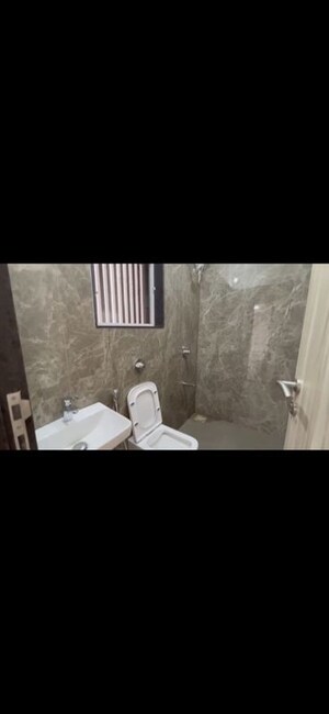 Bathroom in 2 BHK Apartment at Mahaveer Solitaire Edge, Kandivali East – for Rent