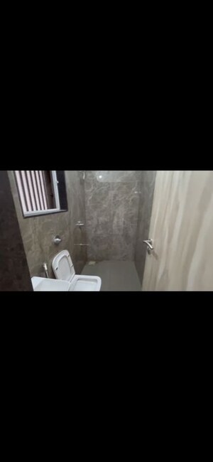 Bathroom in 2 BHK Apartment at Mahaveer Solitaire Edge, Kandivali East – for Rent