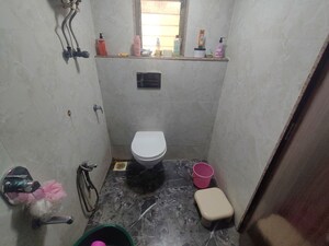 Bathroom in 1 BHK Apartment at Channur Bhavan CHS, Dombivli West – for Rent
