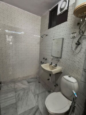 Bathroom in 3 BHK Builder Floor at Kalkaji – for Rent
