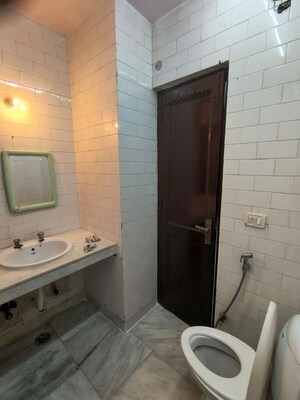 Bathroom in 3 BHK Builder Floor at Kalkaji – for Rent