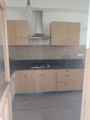 Kitchen in 2 BHK Apartment at Jaypee Green Crescent Court, Jaypee Greens – for Rent