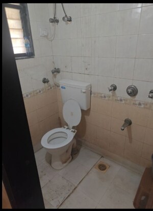 Bathroom in 2 BHK Apartment at Mudit Garden, Kopar Khairane – for Sale