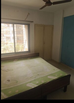 Bedroom in 2 BHK Apartment at Mudit Garden, Kopar Khairane – for Sale