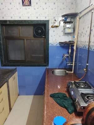 Kitchen in 1.5 BHK Apartment at Ameya House, Vashi Sector 9 – for Rent