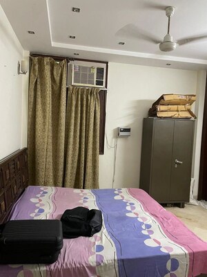 Bedroom in 2 BHK Builder Floor at East Of Kailash – for Rent