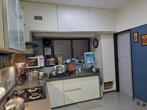 Kitchen in 2 BHK Apartment at Oxford Village Condominium, Wanowrie – for Sale
