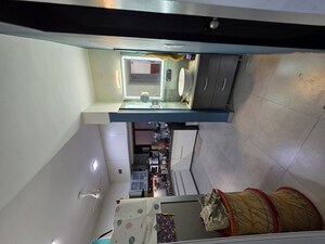 Kitchen in 2 BHK Apartment at Oxford Village Condominium, Wanowrie – for Sale