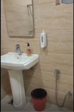 Bathroom in  Office Space at DLF My Pad, Gomti Nagar – for Rent