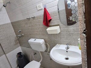 Bathroom in 2 BHK Apartment at Signature Orchard Avenue 2, Sector 93 – for Rent