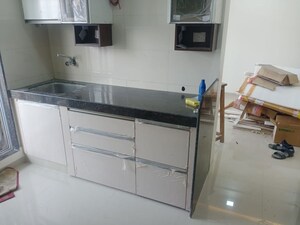 Kitchen in 1 BHK Apartment at Raunak Delight, Owale – for Rent