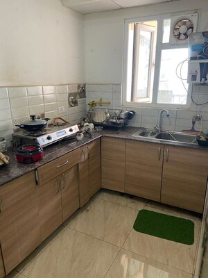 Kitchen in 2 BHK Apartment at Gaur City 7th Avenue, Sector 4 Greater Noida – for Rent