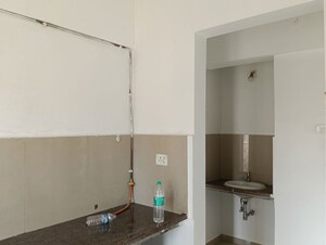 Kitchen in 1 BHK Apartment at Puranik Aarambh, Ghodbunder Road – for Rent