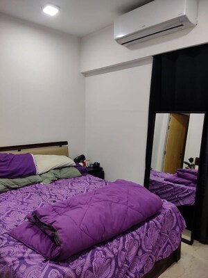 Bedroom in 2 BHK Apartment at Shapoorji Pallonji Astron, Kandivali East – for Rent