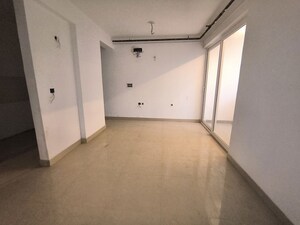 Living Room in 2 BHK Apartment at Sikka Kaamya Greens, Sector 10 Greater Noida – for Sale