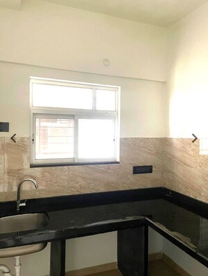 Kitchen in 1 BHK Apartment at Gulmohar Paradise Homes, Kharadi – for Rent