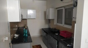 Kitchen in 3 BHK Apartment at Pardos Okas Residency, Sushant Golf City – for Rent