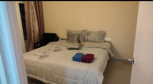 Bedroom in 3 BHK Apartment at Pardos Okas Residency, Sushant Golf City – for Rent