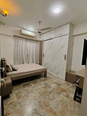 Bedroom in 2 BHK Apartment at Hiranandani Meadows, Manpada – for Rent