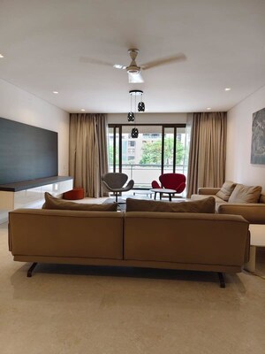 Living Room in 4 BHK Apartment at Panchshil One North, Magarpatta City – for Rent