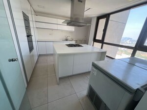 Kitchen in 4 BHK Apartment at Panchshil One North, Magarpatta City – for Rent