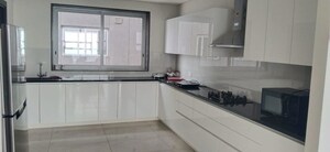 Kitchen in 6 BHK Apartment at Panchshil Towers, Kharadi – for Rent