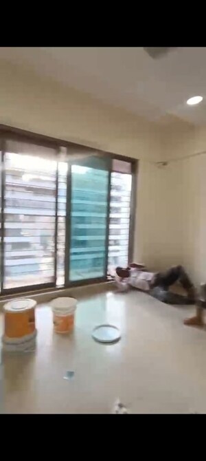 Room in 2 BHK Apartment at Orchid Towers, Andheri West – for Rent