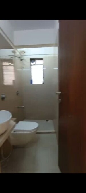 Bathroom in 2 BHK Apartment at Orchid Towers, Andheri West – for Rent