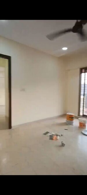 Room in 2 BHK Apartment at Orchid Towers, Andheri West – for Rent