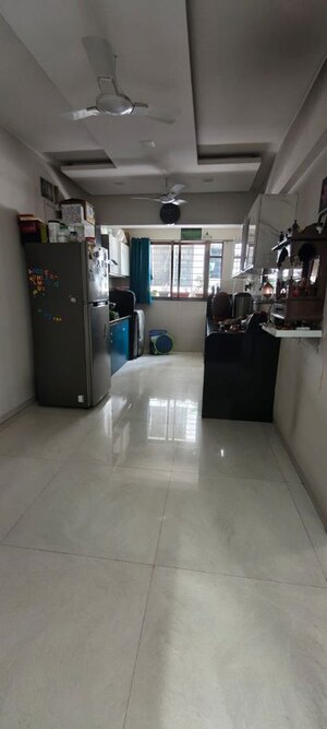 Living Room in 2 BHK Apartment at Chloris CHS, Balewadi – for Rent