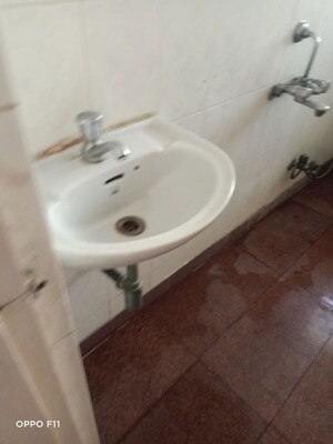 Bathroom in 2 BHK Apartment at Dheeraj Ganga, Malad West – for Rent