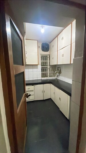Kitchen in 1.5 BHK Apartment at Kalkaji – for Sale