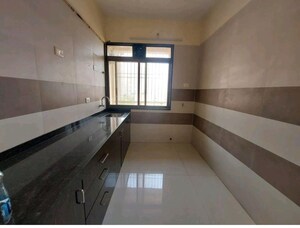 Kitchen in 2 BHK Apartment at Gami Reagan, Ghansoli – for Rent