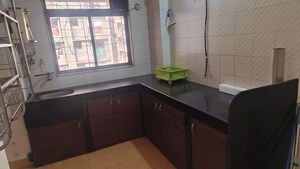 Kitchen in 2 BHK Apartment at Runwal Regency, Majiwada – for Rent