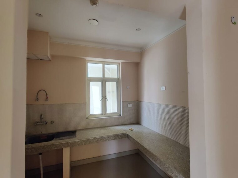 Kitchen, supertech-eco-village-ii 2.5 Bedroom 1267 Sq.Ft. Apartment In Sector 16b Greater Noida Greater Noida 10326942