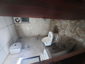 Bathroom in Studio Apartment at Supertech Czar Suites, Omicron I Greater Noida – for Rent