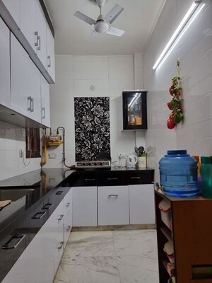 Kitchen in 2 BHK Builder Floor at Rajouri Garden – for Sale