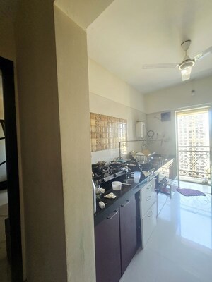 Kitchen in 1 BHK Apartment at Rosa Oasis, Thane West – for Rent