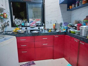Kitchen in 1 BHK Apartment at Unnathi Woods Phase 1 And 2, Ghodbunder Road – for Rent