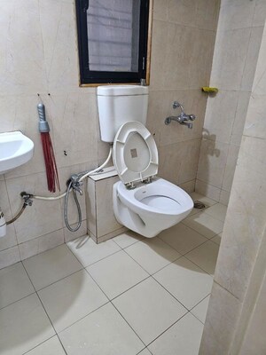 Bathroom in 2 BHK Apartment at Puranik Hometown, Ghodbunder Road – for Rent