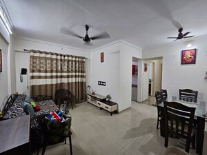 Living Room in 2 BHK Apartment at Puranik Hometown, Ghodbunder Road – for Rent