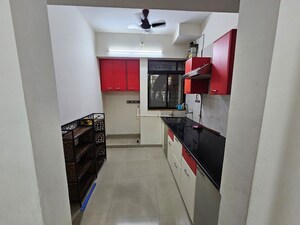 Kitchen in 2 BHK Apartment at Puranik Hometown, Ghodbunder Road – for Rent