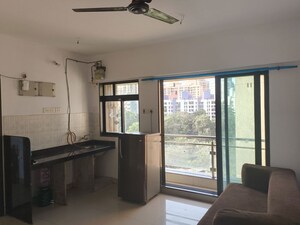 Kitchen in 1 BHK Apartment at Haware Dahlia, Kasarvadavali – for Rent