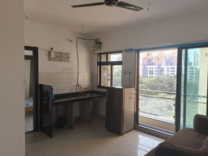Living Room in 1 BHK Apartment at Haware Dahlia, Kasarvadavali – for Rent