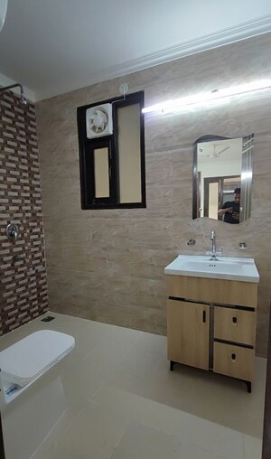 Bathroom in 4 BHK Builder Floor at Palm Residency Chhatarpur, Chattarpur – for Rent