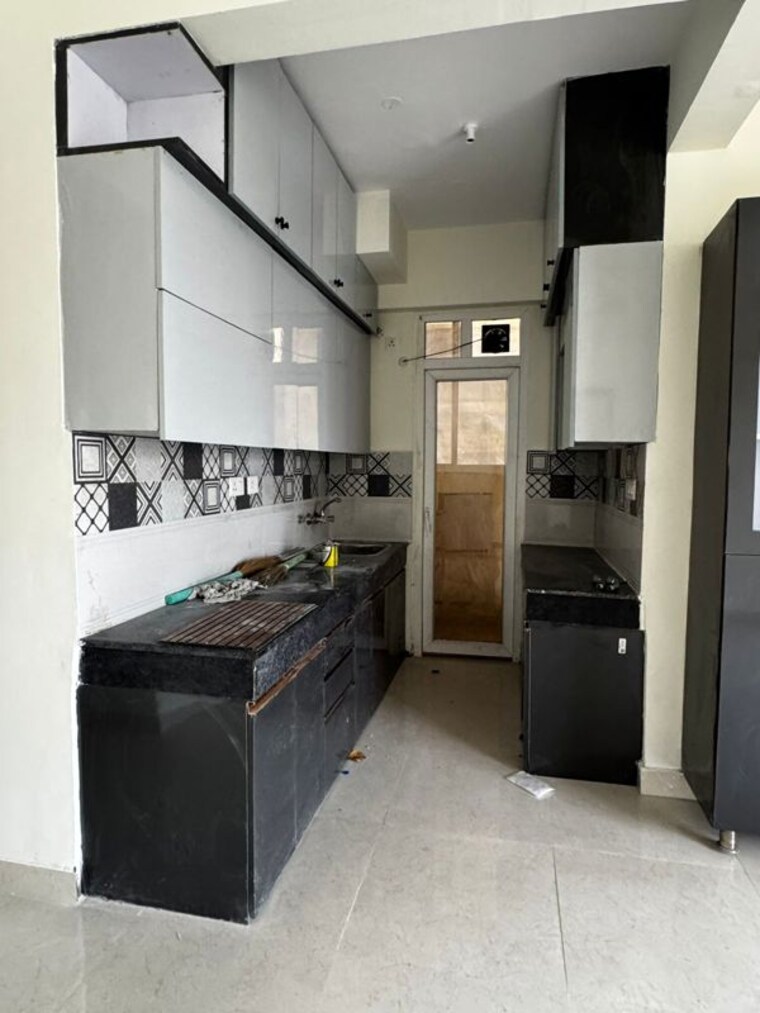Kitchen, signature-the-serenas 2 Bedroom 583 Sq.Ft. Apartment In Sohna Sector 36 Gurgaon 10329428