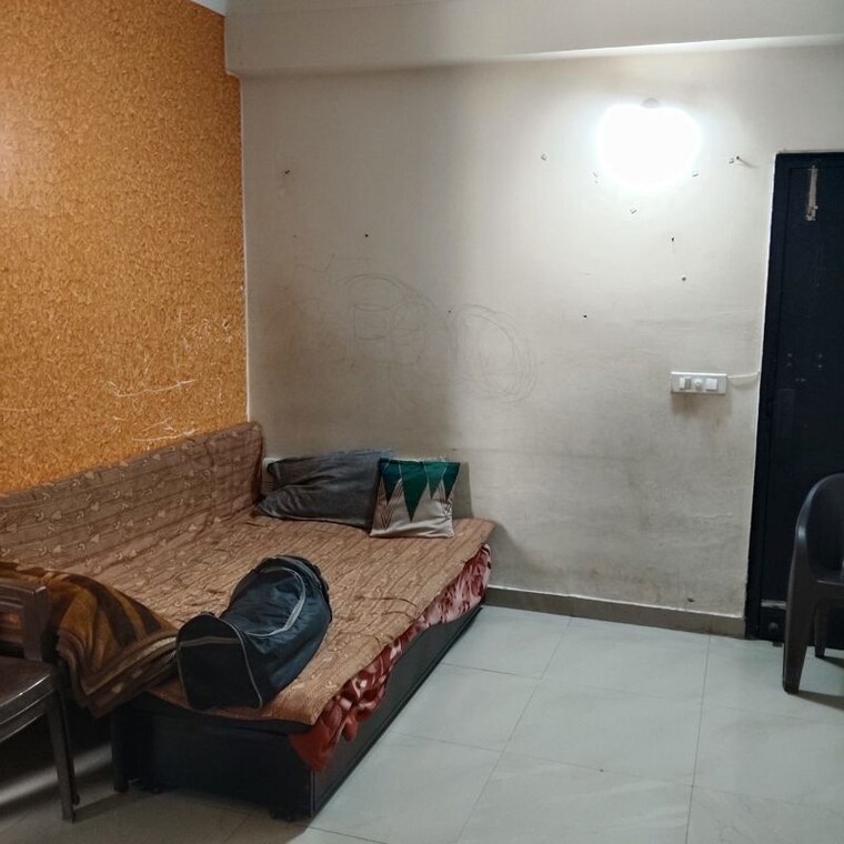 Living Room, maya-green-lotus-saksham 1 Bedroom 750 Sq.Ft. Apartment In International Airport Road Zirakpur 10329465