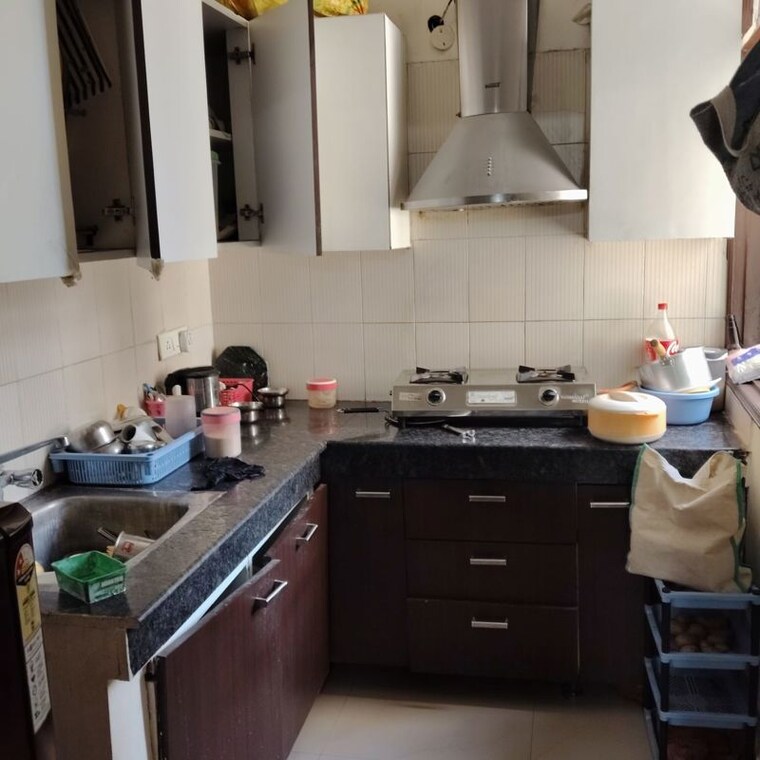 Kitchen, maya-green-lotus-saksham 1 Bedroom 750 Sq.Ft. Apartment In International Airport Road Zirakpur 10329465