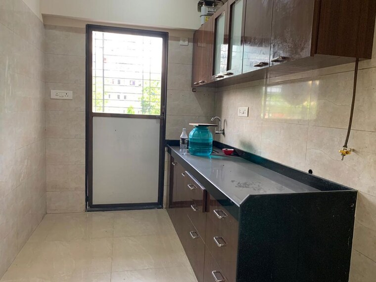 Kitchen, ameet-tower 2 Bedroom 975 Sq.Ft. Apartment In Chembur Mumbai 10329497