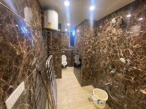 Bathroom in 4 BHK Apartment at Mahagun Mezzaria, Sector 78 – for Rent